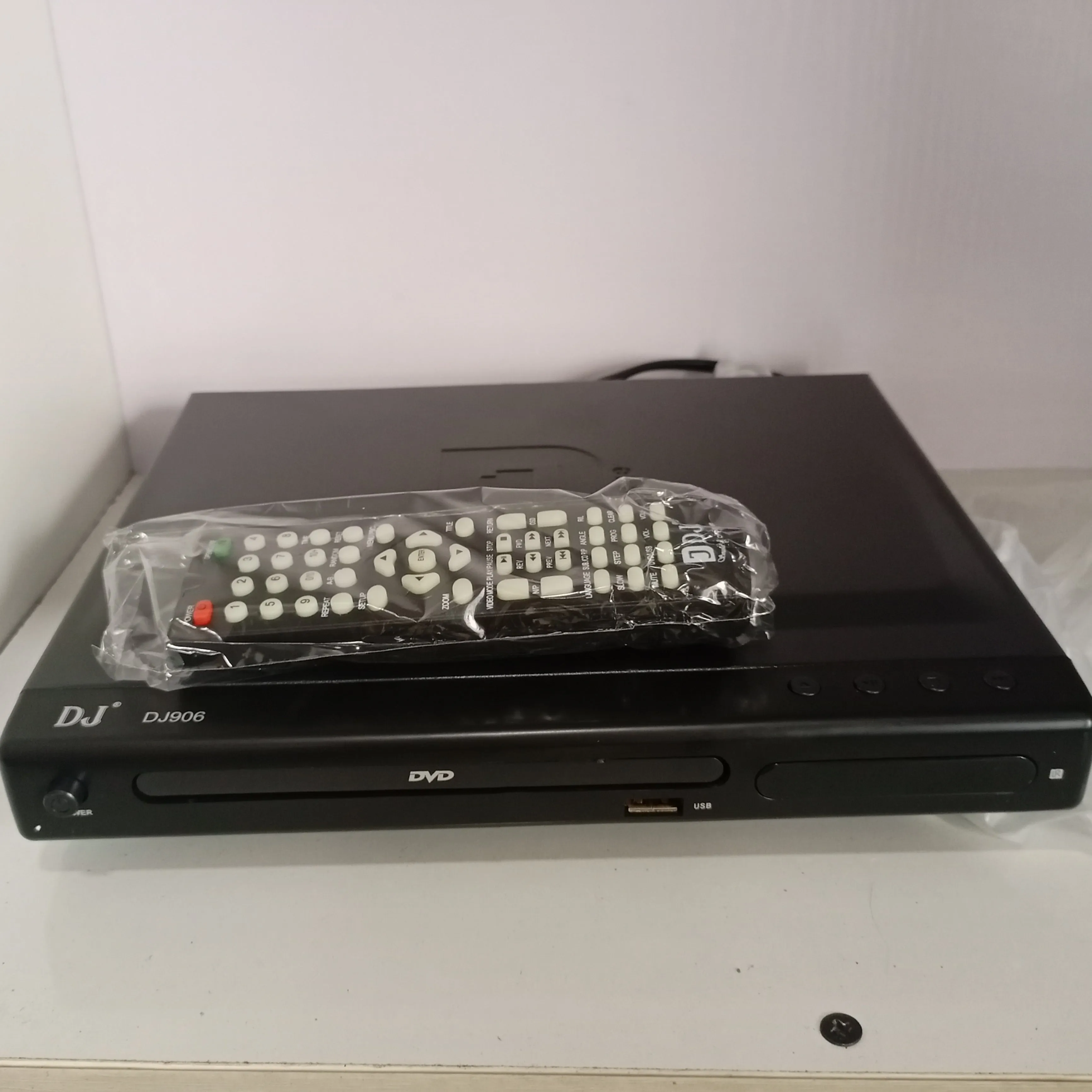 DJACK DJ906 Multi-Playback DVD Player with Last Memory and USB & SD Support - Brand New